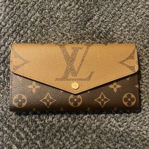 Wallet that has never been used. Asking price is high due to multiple offers.